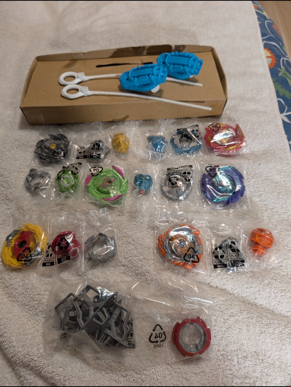 Hasbro Beyblader Blue Turbo Launcher and Assorted Burst Spinners